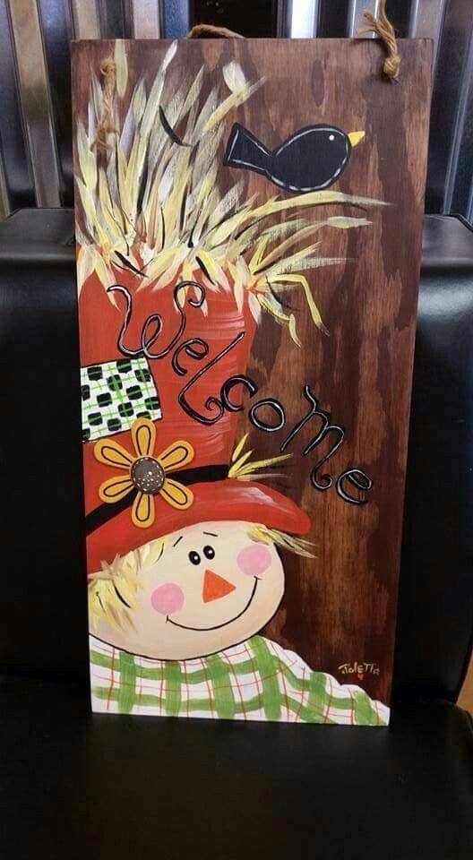 Acrylic painting of fall scarecrow.